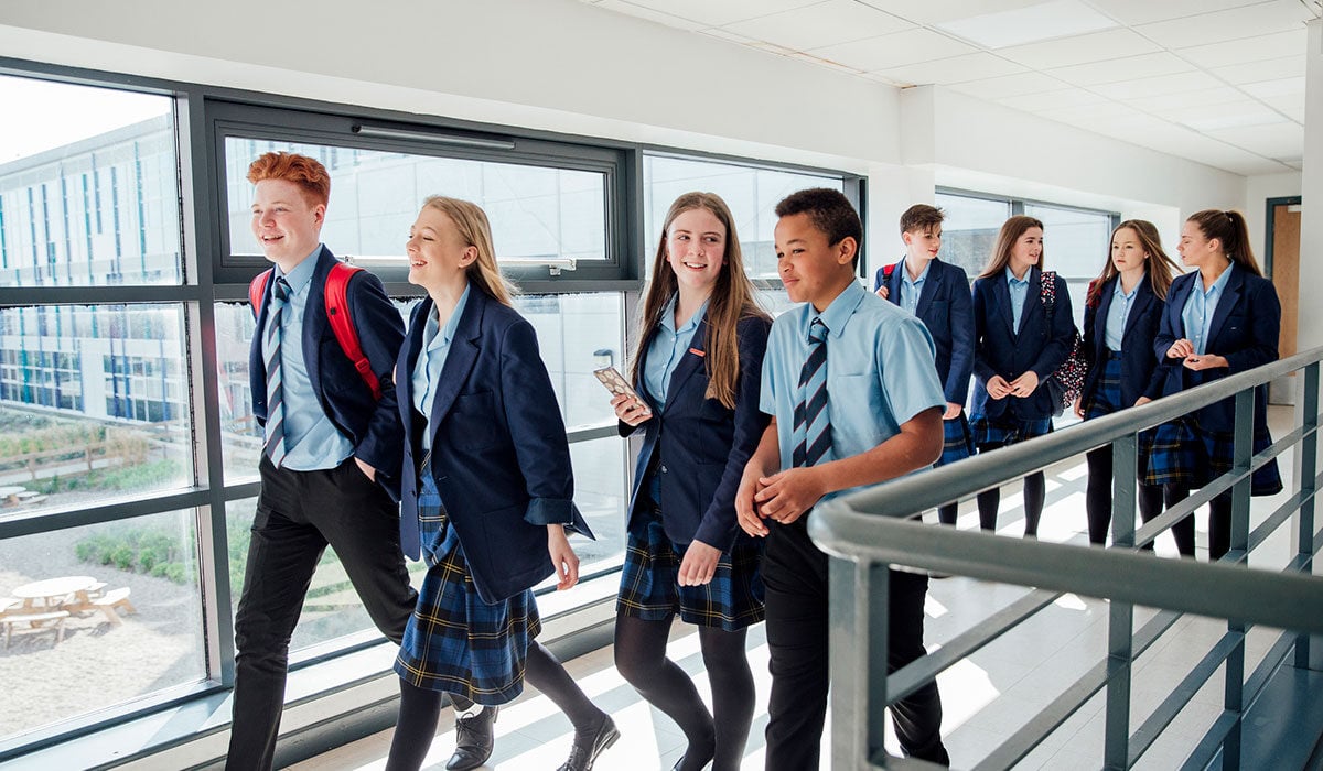High school students walking to their next class